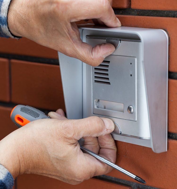 close-up-of-a-male-hands-repairing-intercom-verti-2025-10-09-07-37-13-utc