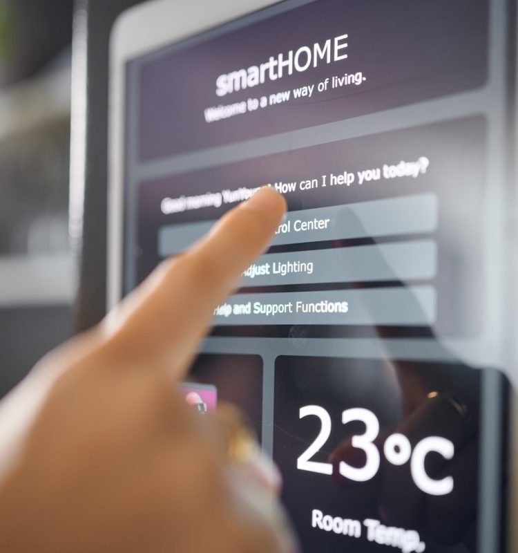Smart home technology, wall and hands of woman with digital app monitor for thermostat heating, sec.